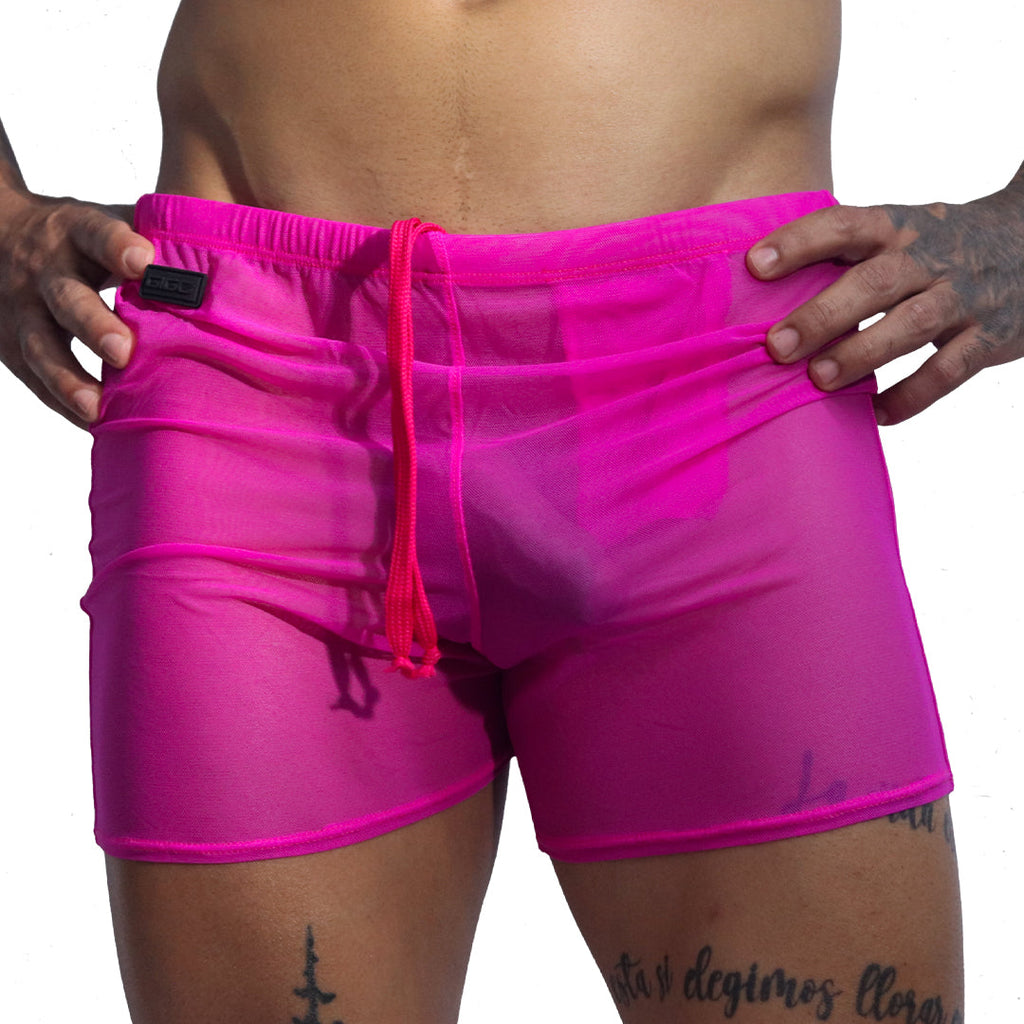 Front view of Gigo Spectrum fuchsia sheer mesh hot shorts with drawstring and brand logo patch.