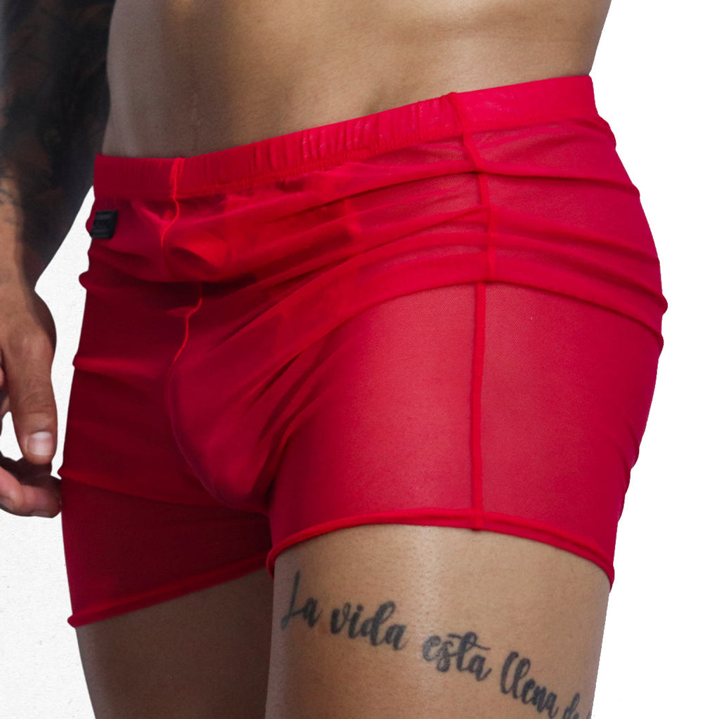 Side view of Gigo Spectrum red sheer mesh hotshort underwear with ruched side panel details on a model.