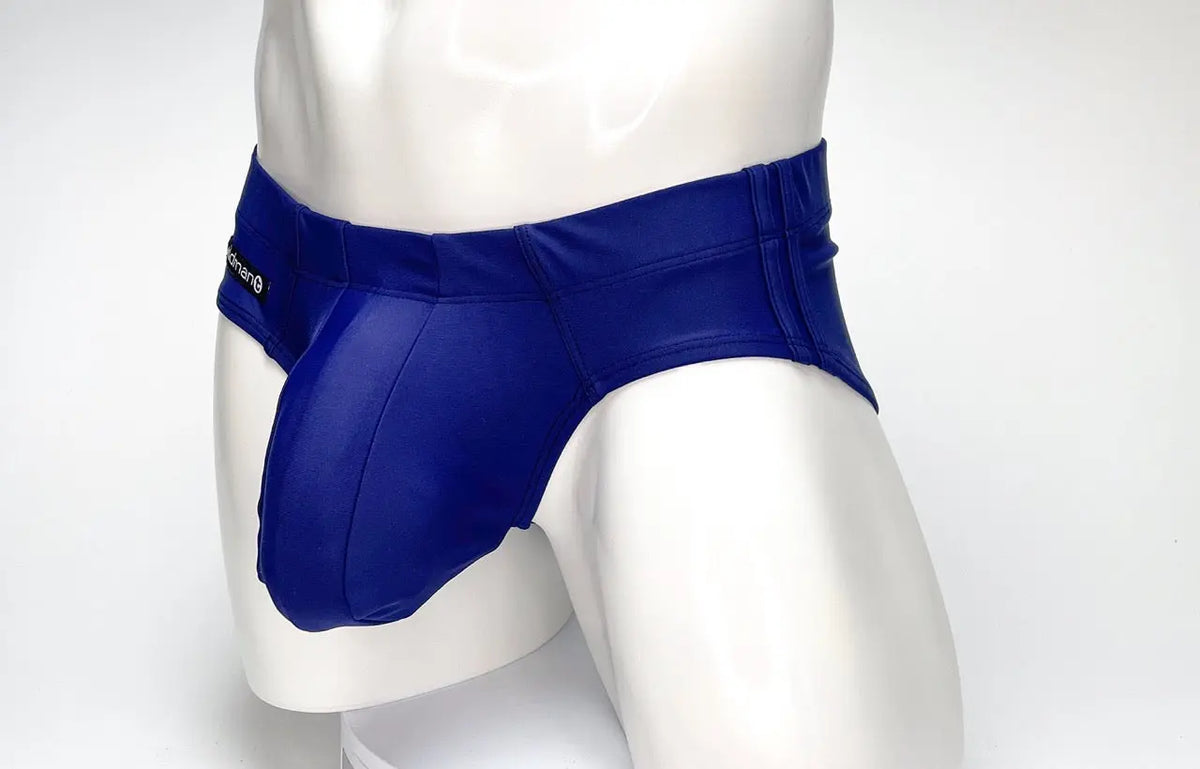 Blue briefs with a pouch on a white mannequin against a white background.