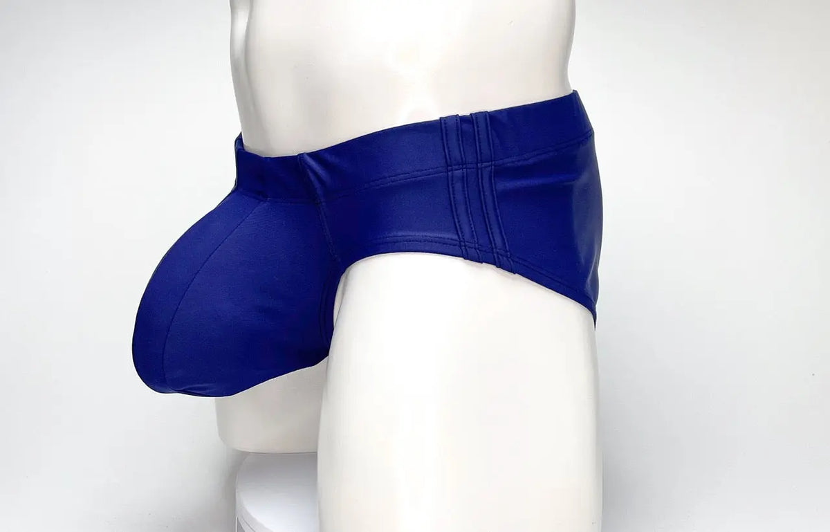 Blue brief-style garment with a front pouch on a white mannequin.