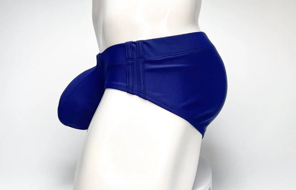 Blue briefs with a side panel on a white mannequin.