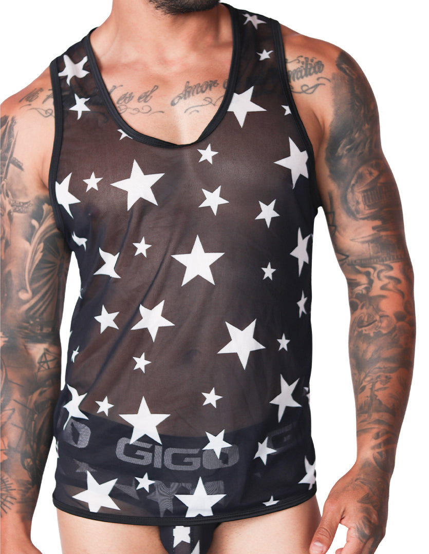 Front view of Gigo sheer black mesh tank top with white star pattern and black trim on a tattooed male model.