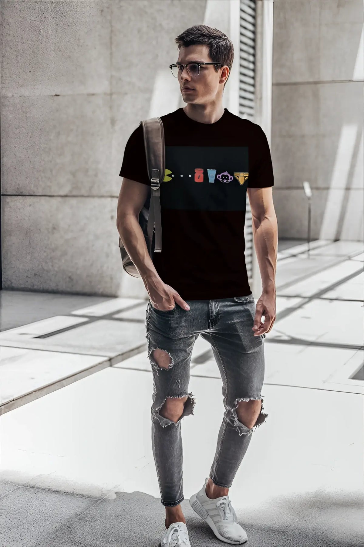 Black short-sleeved t-shirt by t-shirt monkey featuring colorful classic video game characters graphic design
