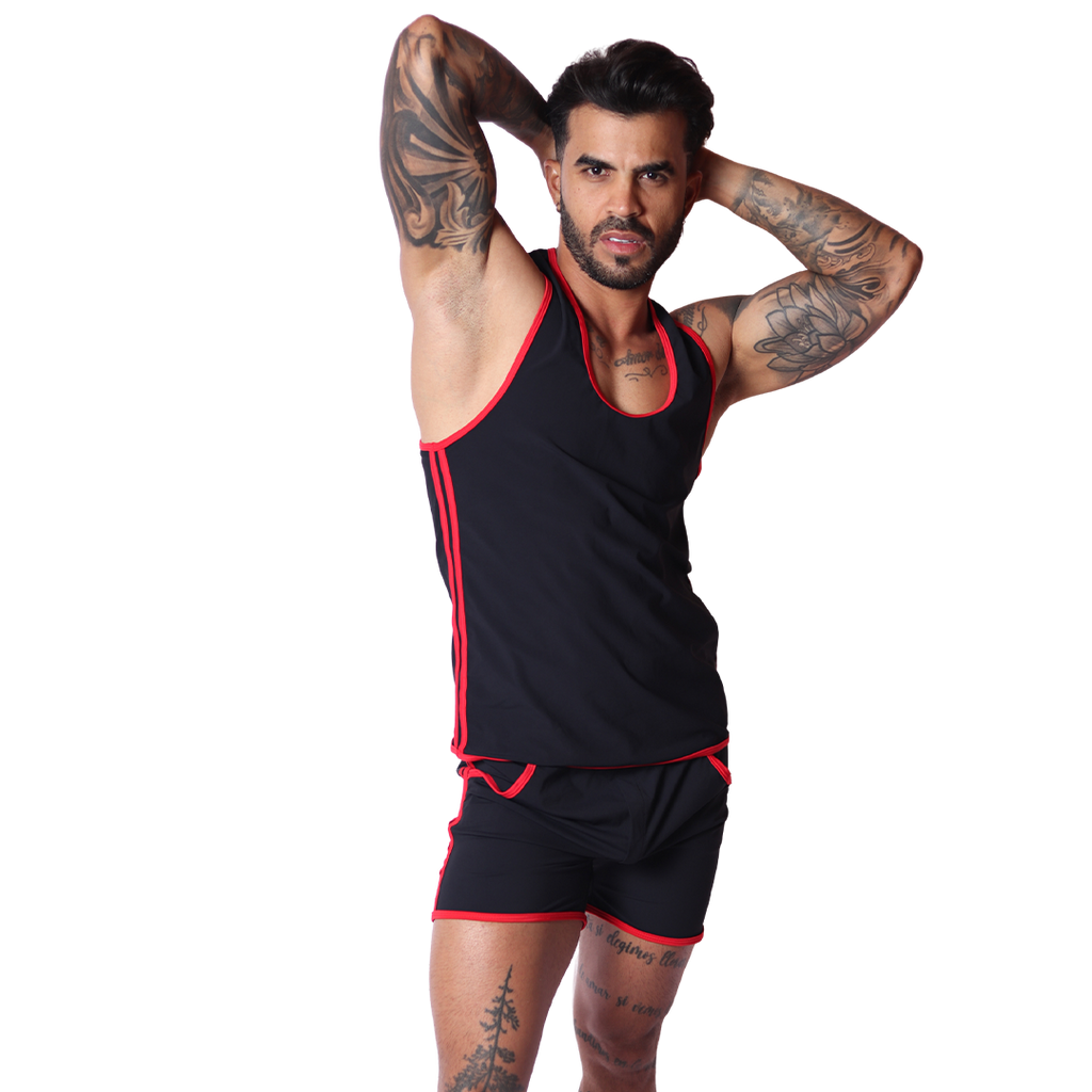 Front view of Gigo Typer black tank top with red trim, soft fabric, paired with matching black and red shorts.