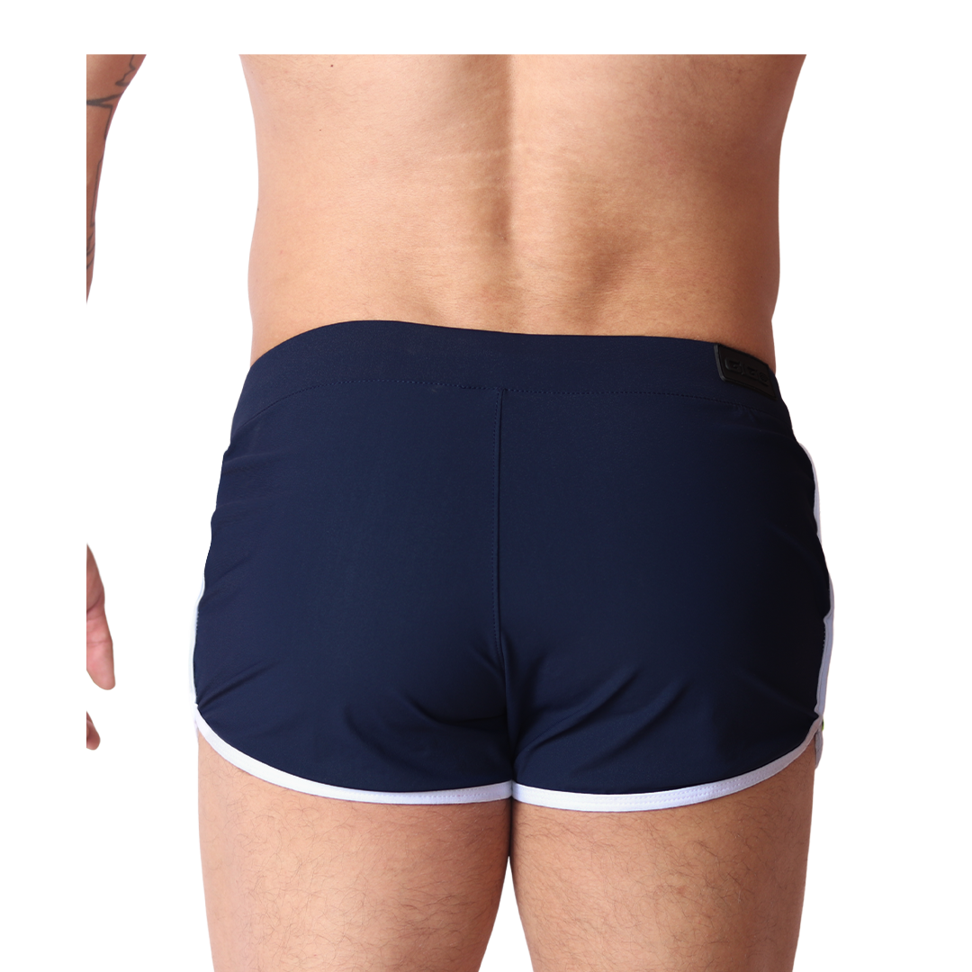 Back view of Gigo Typerhot blue athletic shorts in smooth fabric with white trim detail.