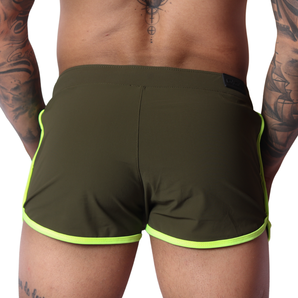 Back view of Gigo Typerhot green athletic shorts with neon yellow trim and smooth performance fabric.