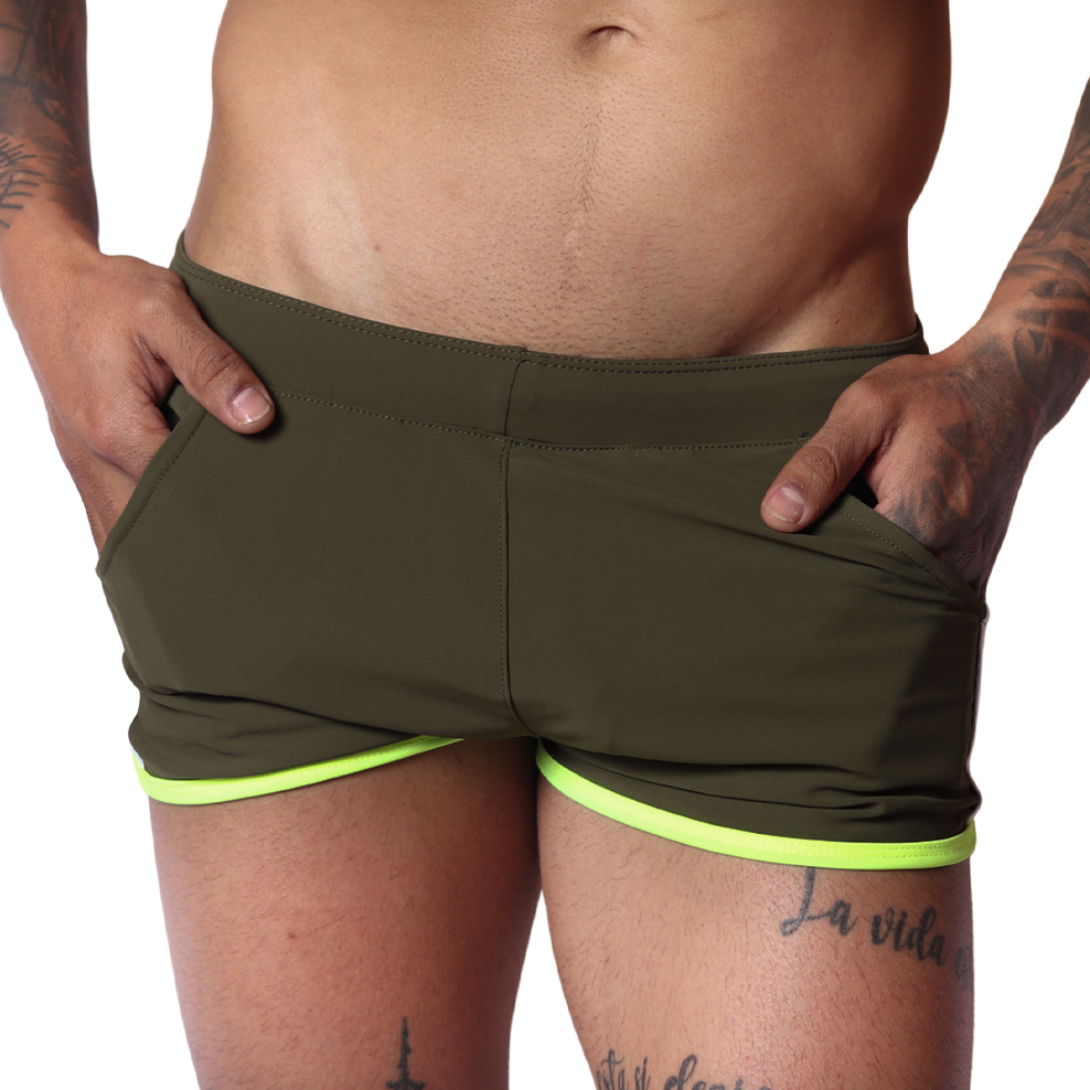 Front view of Gigo Typerhot green athletic shorts in smooth fabric with neon yellow trim and side pockets.