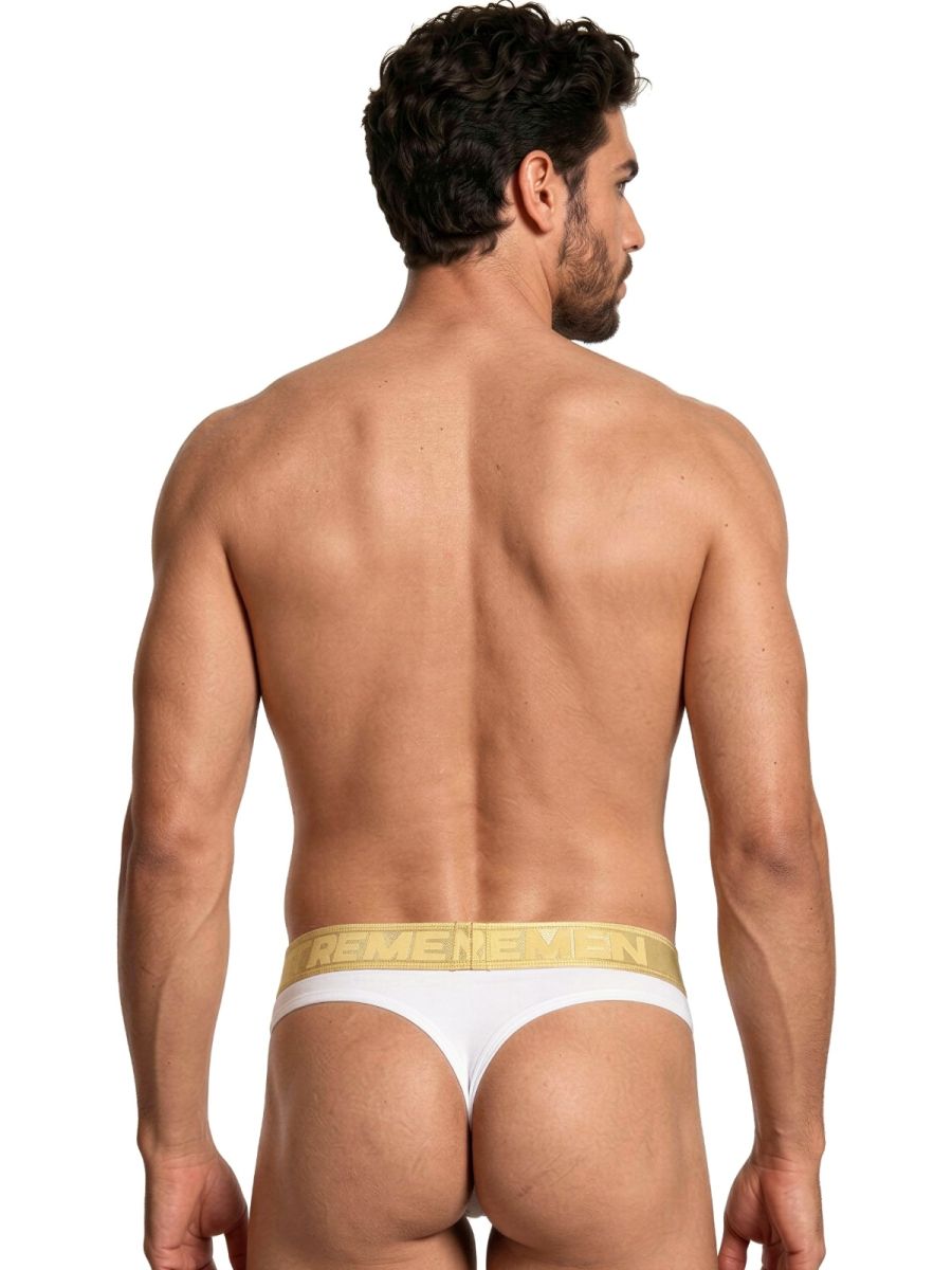 Xtremen white thong with gold branded waistband. Back view of model.