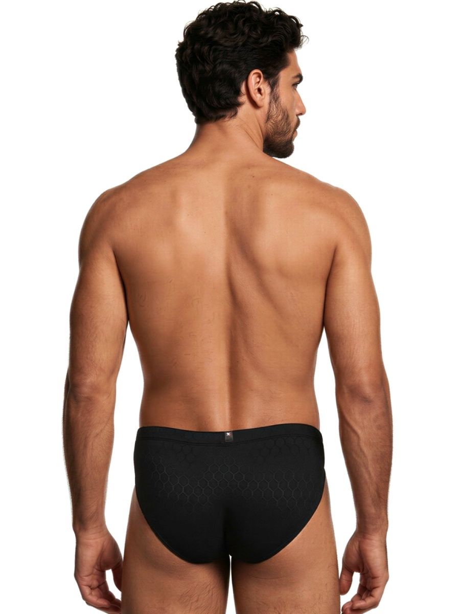 Xtremen black bikini briefs with textured honeycomb pattern, seen from the back. Essential everyday underwear.