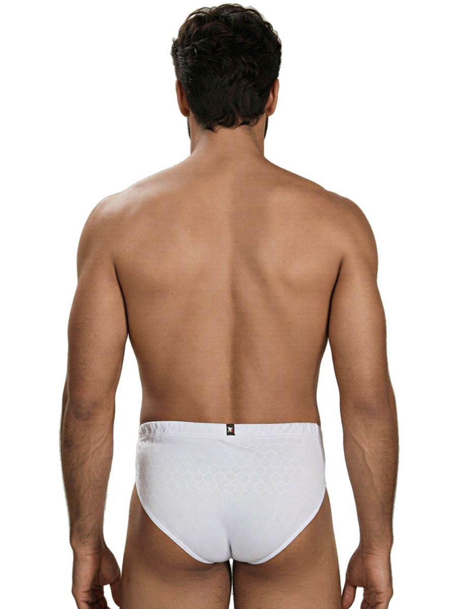 Xtremen white honeycomb-textured brief with branded waistband. Rear view of model.