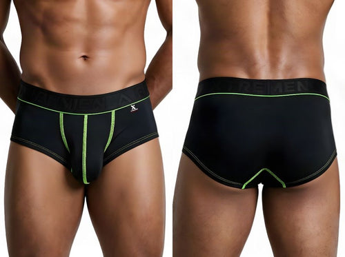 Front and back views of a man wearing black trunks with neon green contrast stitching and a branded waistband.