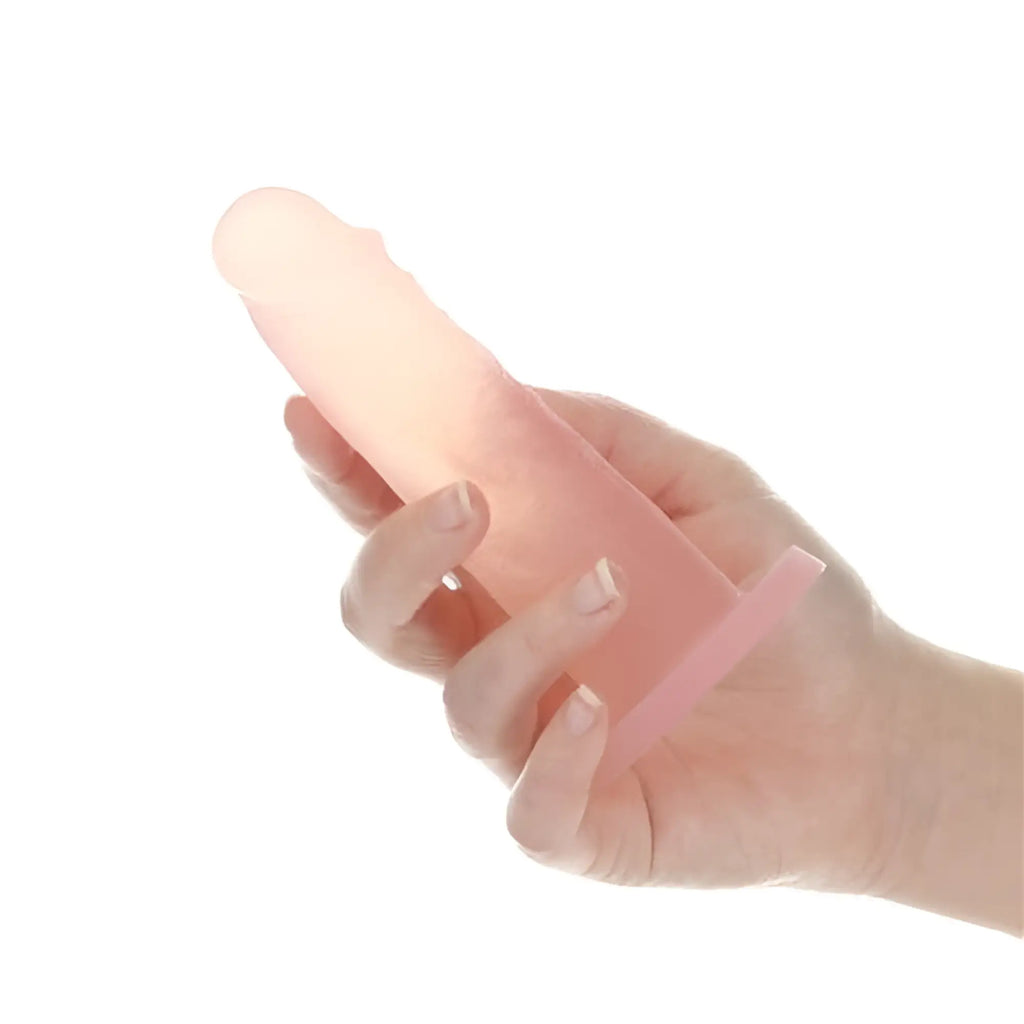 Pink silicone dildo with textured surface and rounded tip from addiction cocktails dildo peach bellini 5.5in