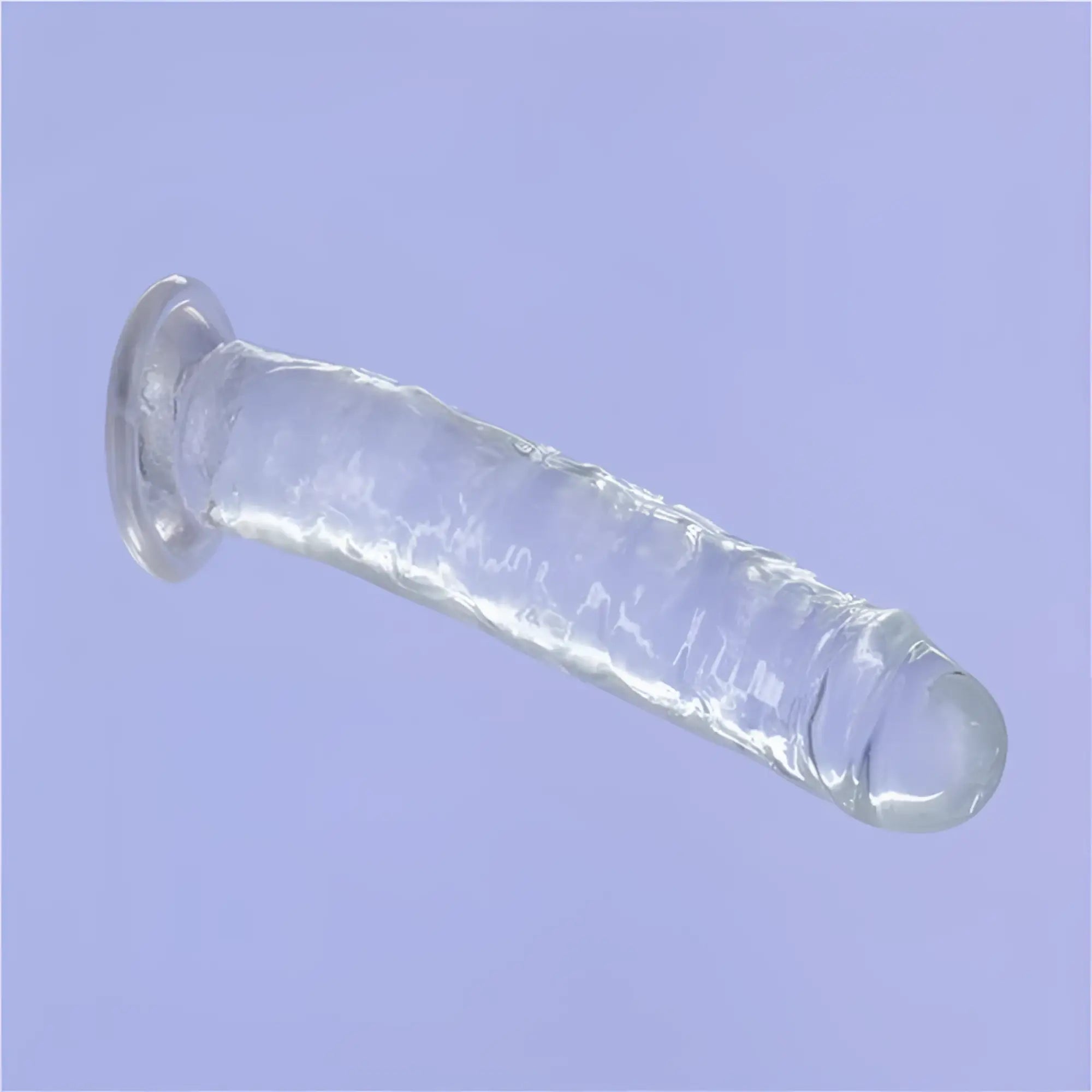 Clear textured silicone anal plug with rounded base and tapered tip from addiction crystal dildo straight 7in clear