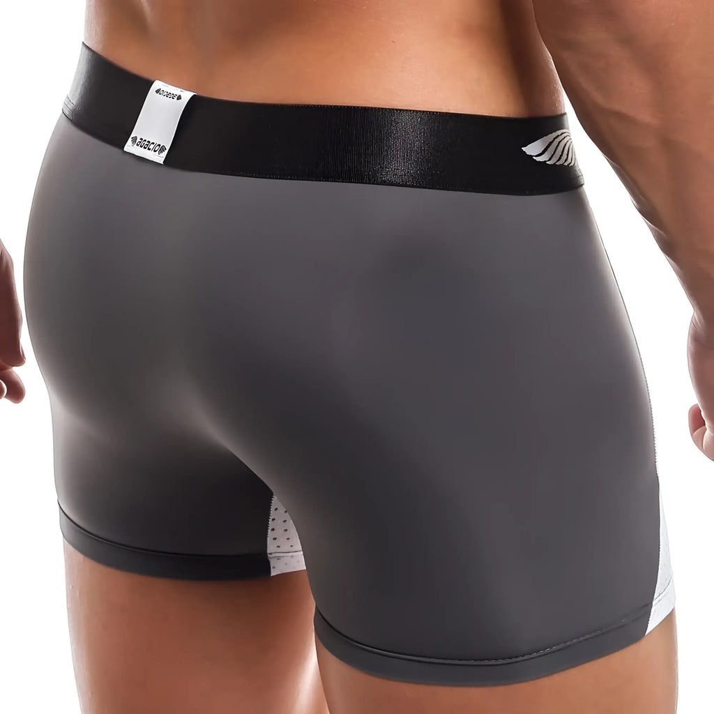 Agacio AGG039 black athletic boxer trunk with sleek form-fitting design and white perforated side panels