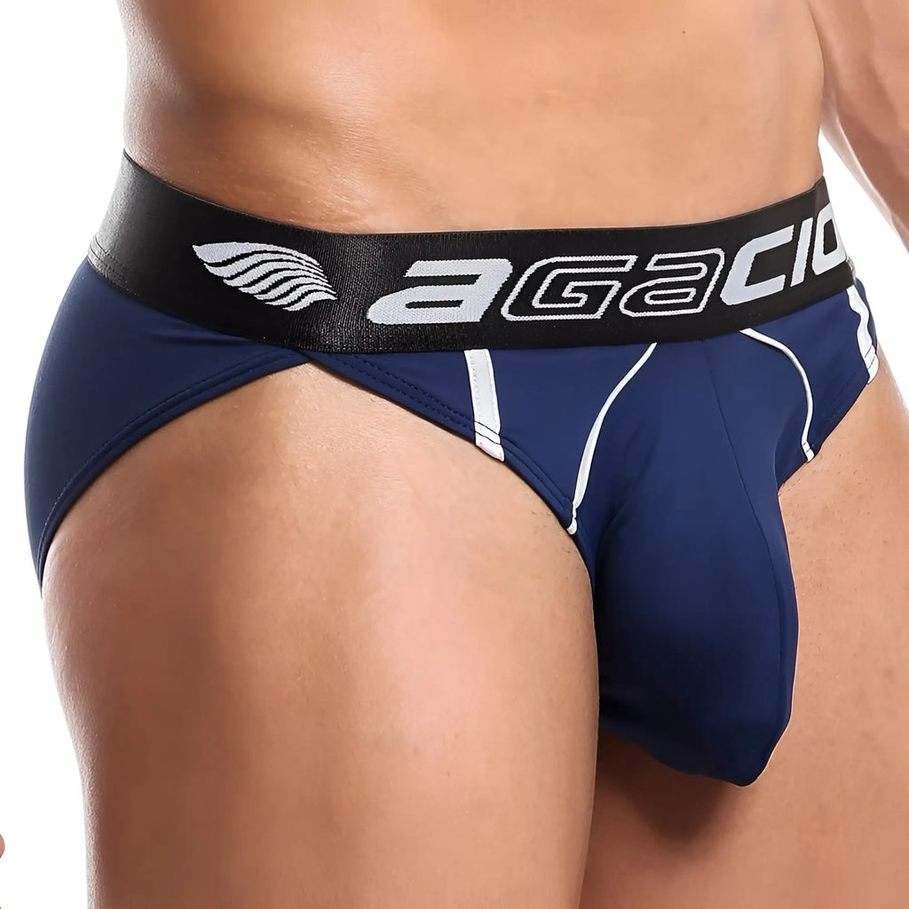 Navy blue agacio AGI010 bikini briefs with black elastic waistband featuring white logo and winged emblem
