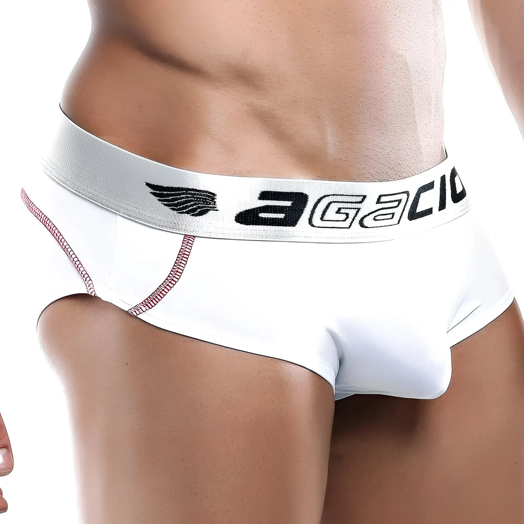 Agacio AGJ013 white menâ€™s briefs with silver waistband black logo wing emblem and pink stitching along side seams