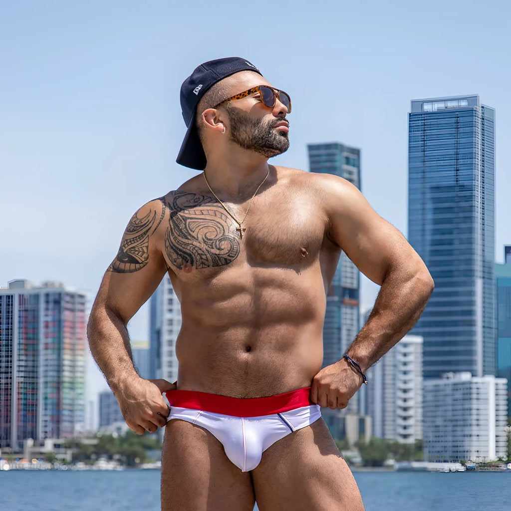 White swim trunks agacio agj039 brief with red waistband and black trim designed for swimwear use