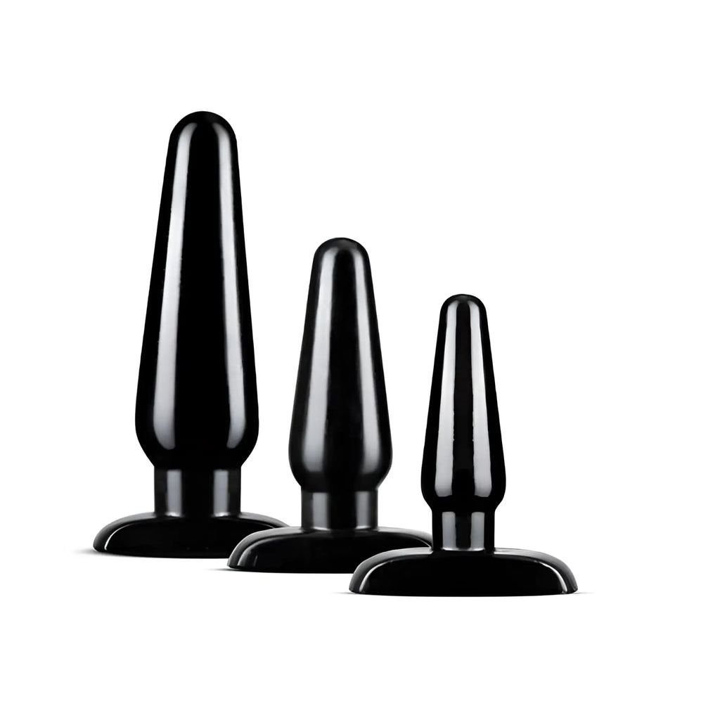 Set of three black plastic anal plugs in varying sizes with smooth tapered designs from Anal Adventures basic plug kit