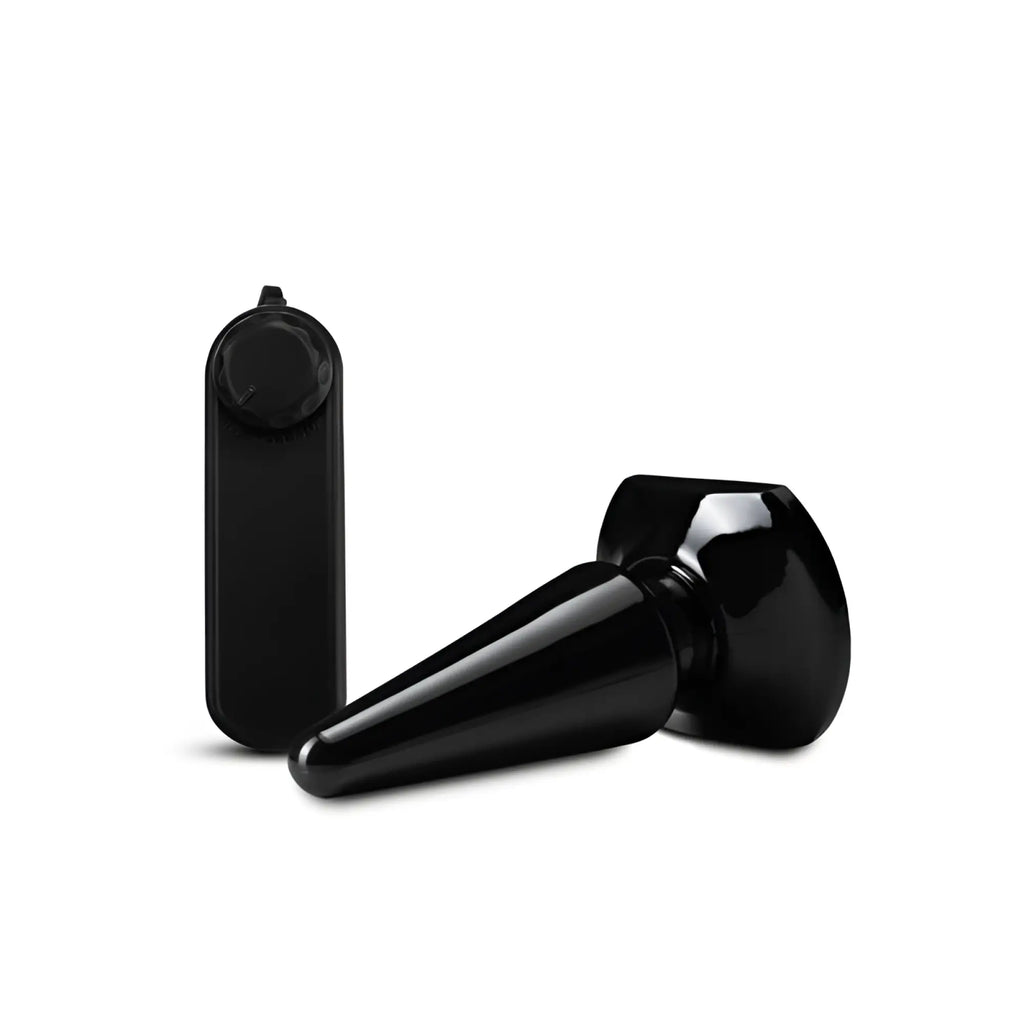 Black glossy plastic anal plug with rounded base and tapered tip for anal pleasures from anal adventures basic vibrating series