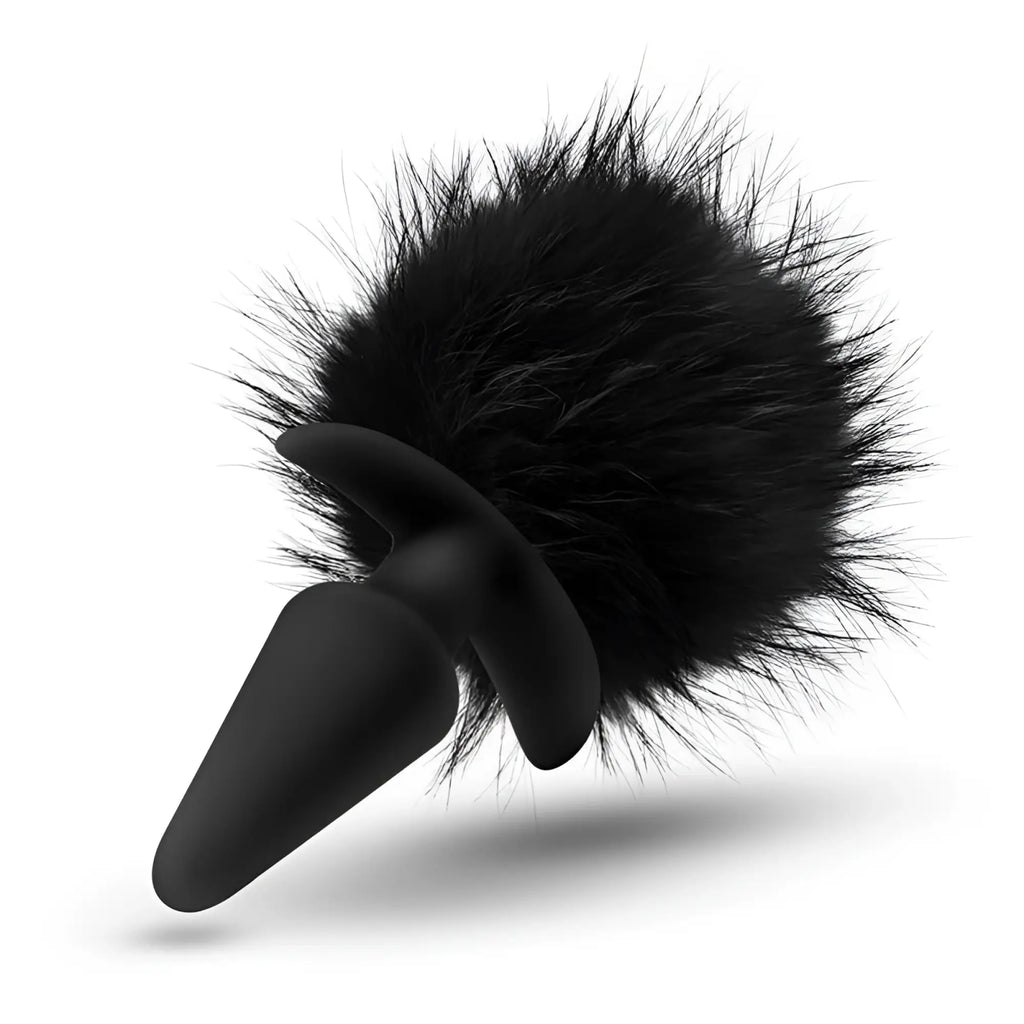 Black silicone anal plug with fluffy black faux fur pom pom from anal adventures platinum rabbit tail plug series
