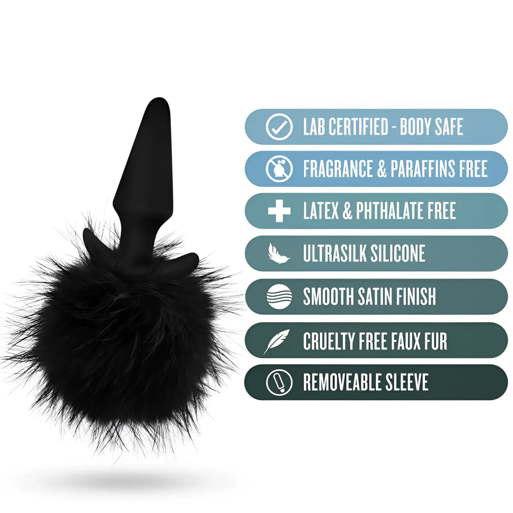 Black silicone anal plug with plush faux fur tail and smooth satin finish from Anal Adventures Platinum collection