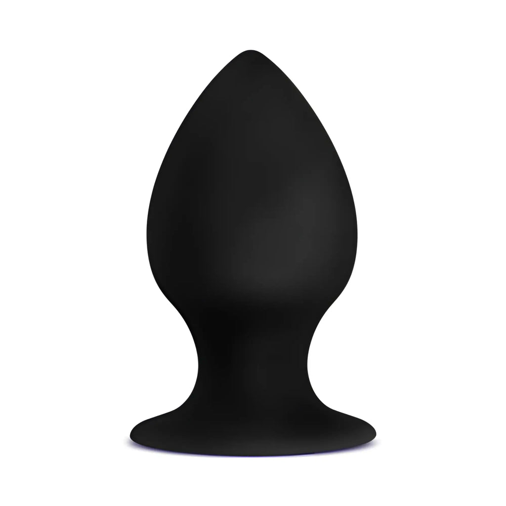 Black silicone anal plug with smooth teardrop shape and rounded base from anal adventures platinum stout plug medium