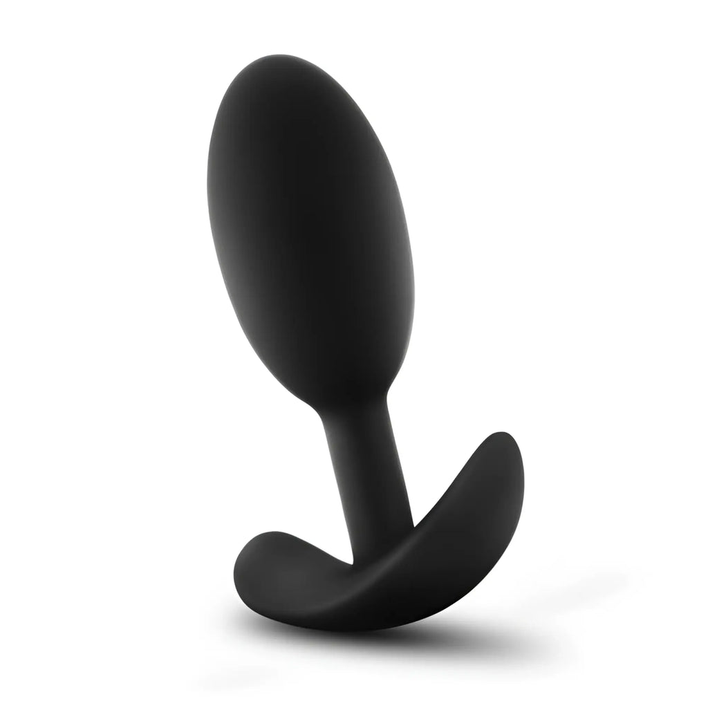 Black silicone anal plug with smooth rounded head and curved base for stability from anal adventures platinum vibra slim plug medium