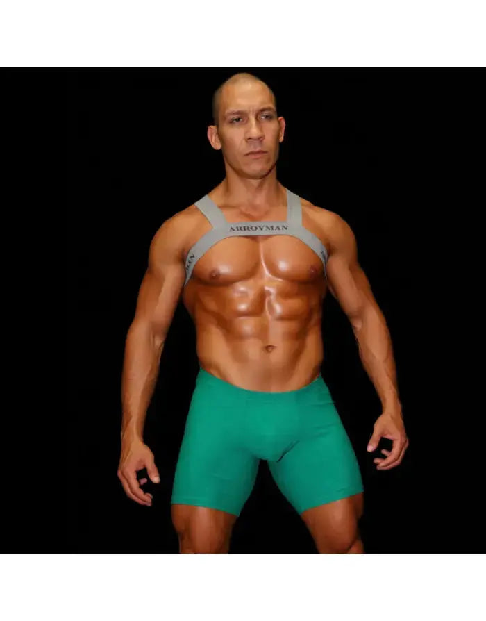 Grey body chest harness by Arroyman worn over a muscular model showcasing a fitted design and adjustable straps.