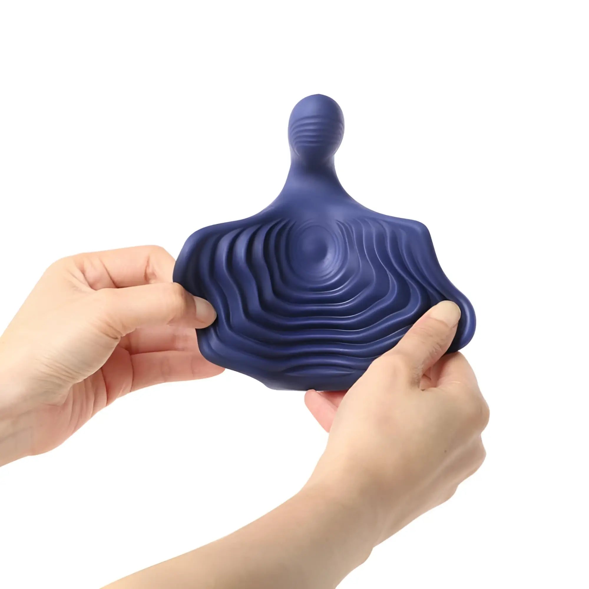 Deep blue ergonomic stress-relief fidget toy with concentric ridges shaped like a human figure for pulsatex stimulator