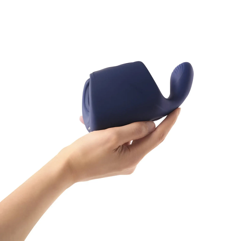 Navy blue silicone rechargeable male shaft and glans stimulator with curved ergonomic design on back side