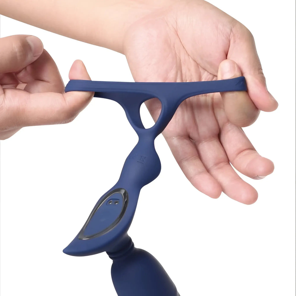 Blue silicone arosum ring n rear dual thrusting anal probe with cockring and remote showing control panel on handle
