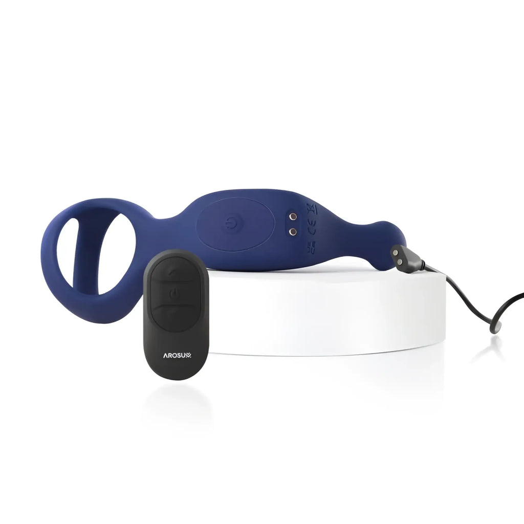 Blue silicone arosum underquaker vibrating anal probe with cockring and black remote control displayed front view