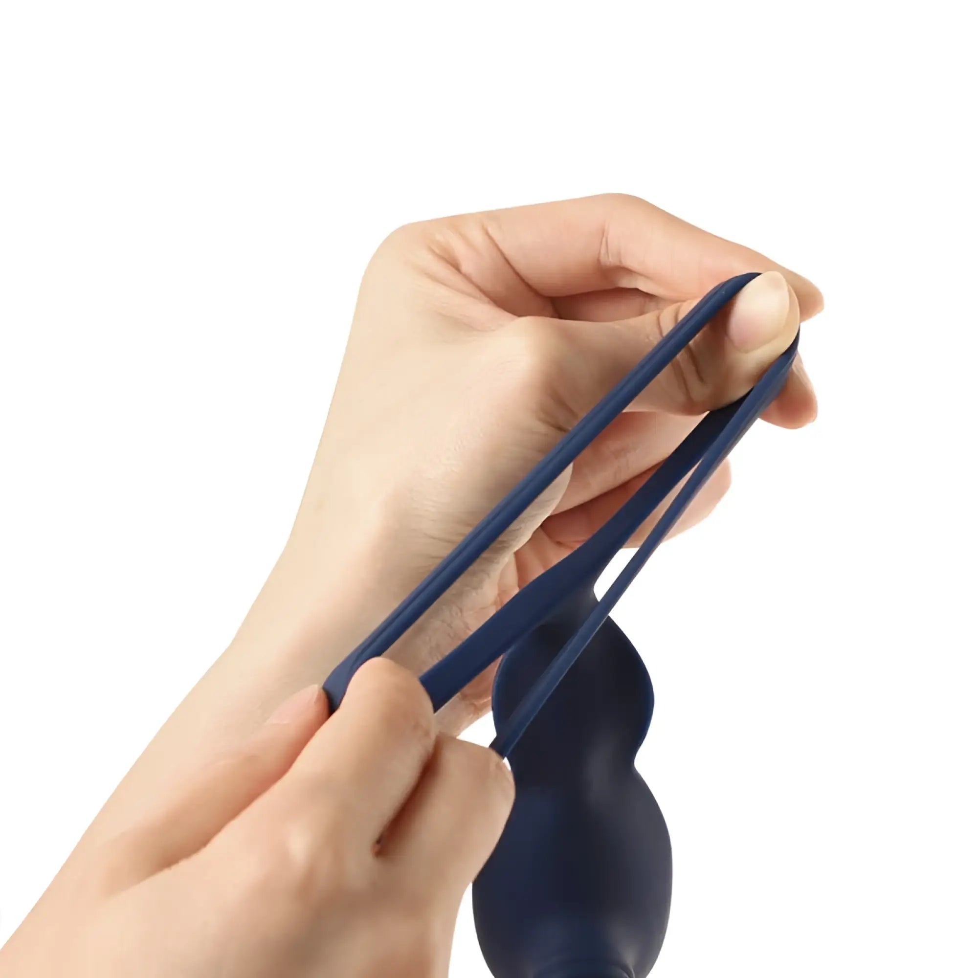 Dark blue silicone anal plug with smooth rounded design and tapered ends from arosum vibraduo vibrating anal probe and perineum stim with cockring