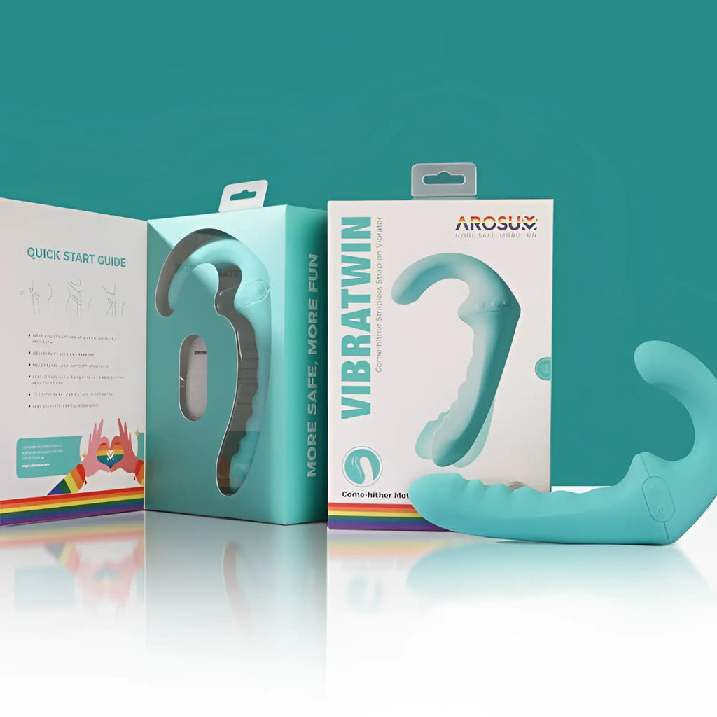 Arosum vibratwin rechargeable come hither strapless strap on in teal silicone with ergonomic curves and textured grip areas