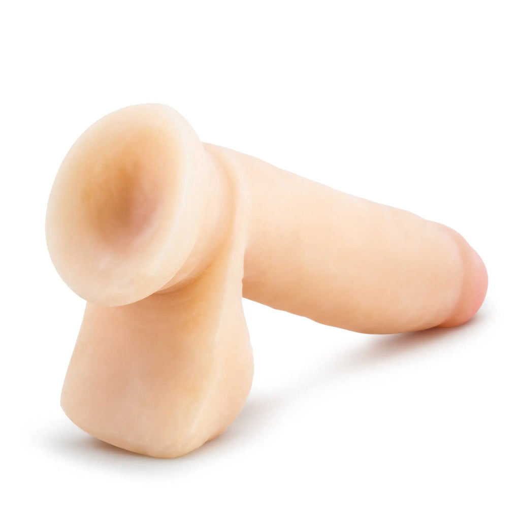 Beige silicone realistic male masturbator with rounded head and tapered shaft from au naturel sensa feel dildo line