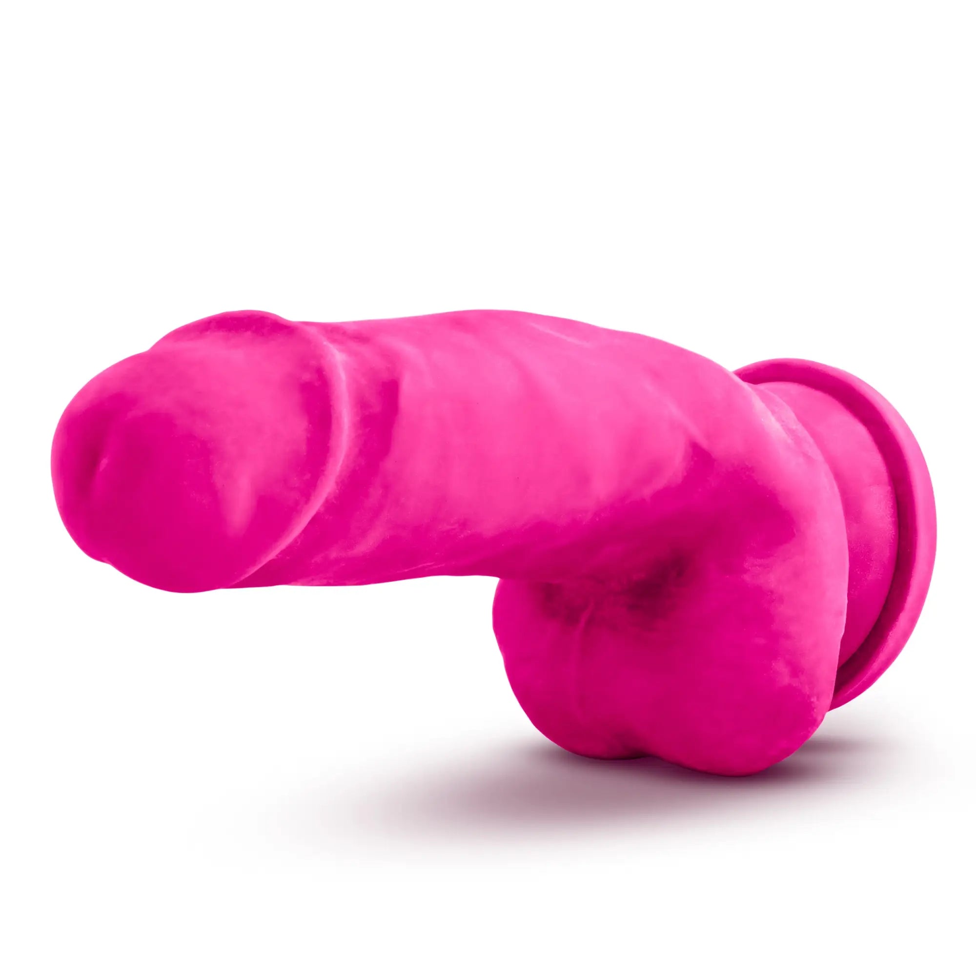 Vibrant pink silicone dildo with smooth glossy finish and rounded contours au naturel bold beefy 7in model