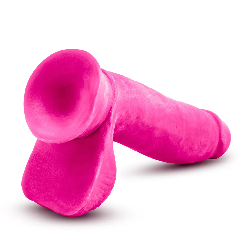 Vibrant pink silicone dildo au naturel bold pleaser 7in with textured matte finish and ergonomic design