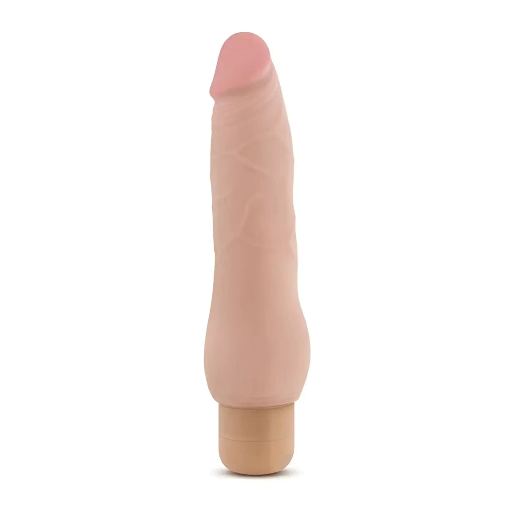 Beige silicone phallic-shaped vibrator with textured surface and rounded tip from au naturel fabien collection
