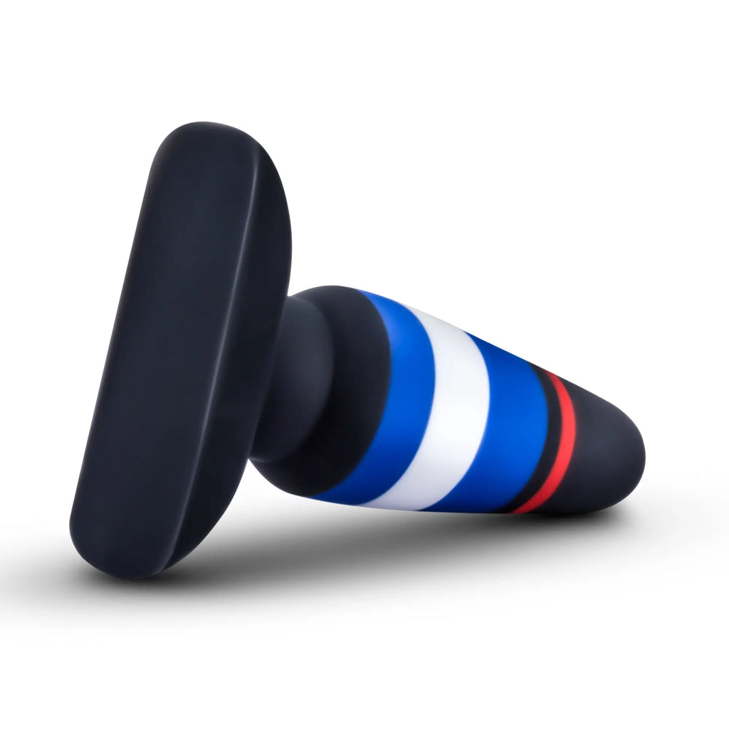 A sleek ergonomic avant avant pride p4 power play silicone butt plug with a matte black body and blue white red stripes