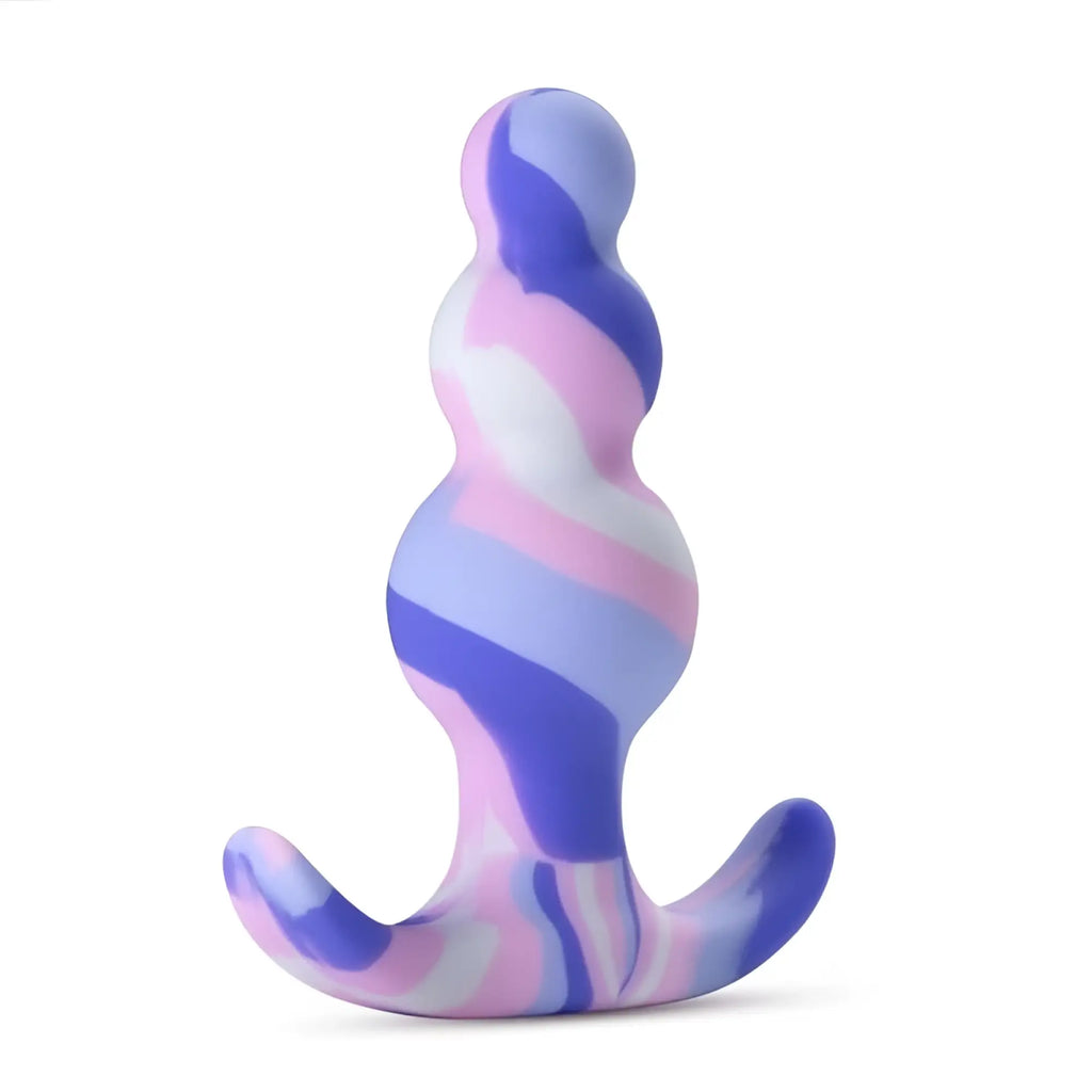 A smooth silicone anal plug with a swirling pattern of pink purple and white from avant twilight blue series