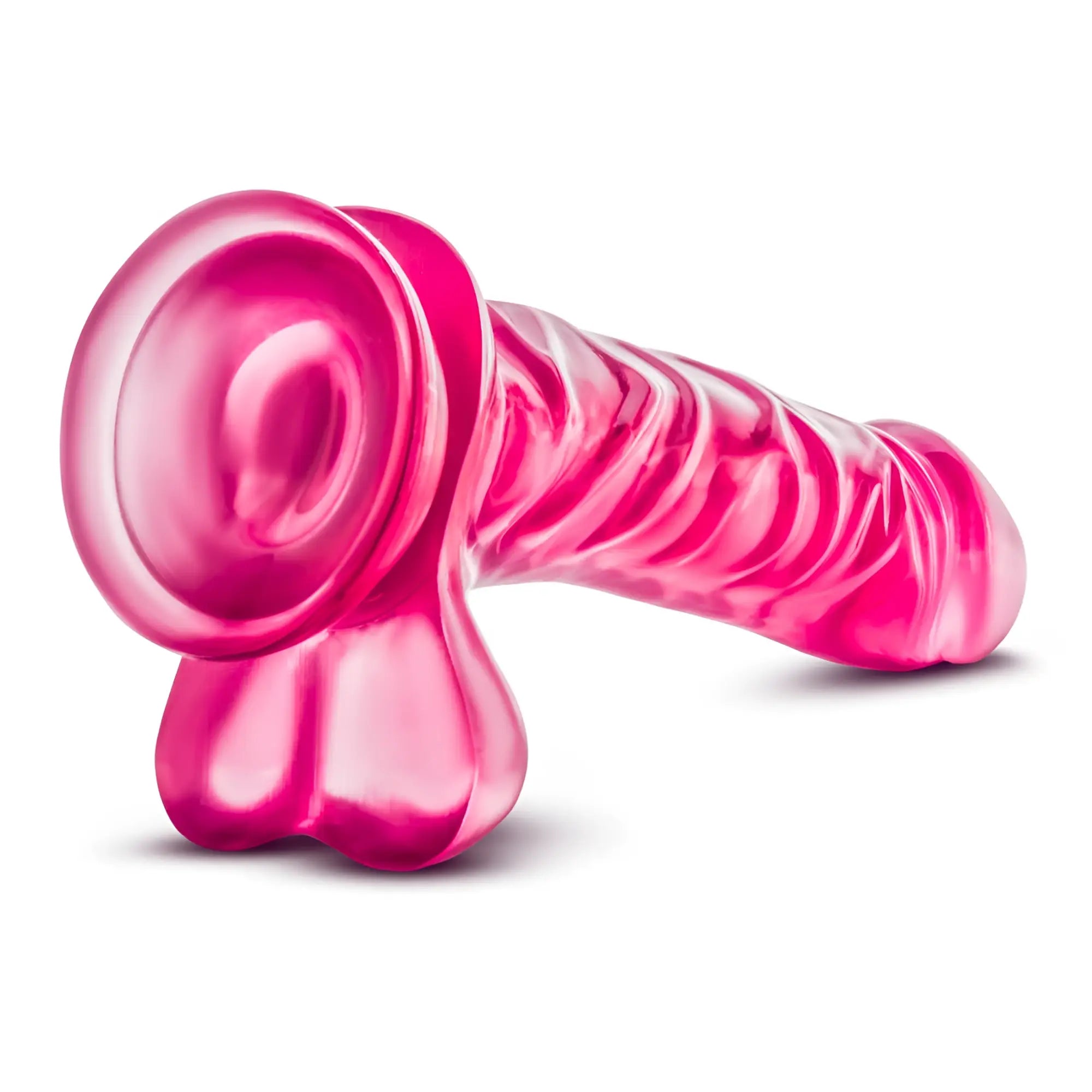 Vibrant pink translucent silicone ribbed toy with rounded base from b yours b yours basic 8 collection