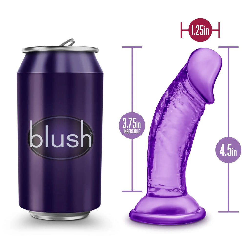 Purple translucent silicone dildo with rounded head flared base suction cup branded blush beside soda can for size comparison