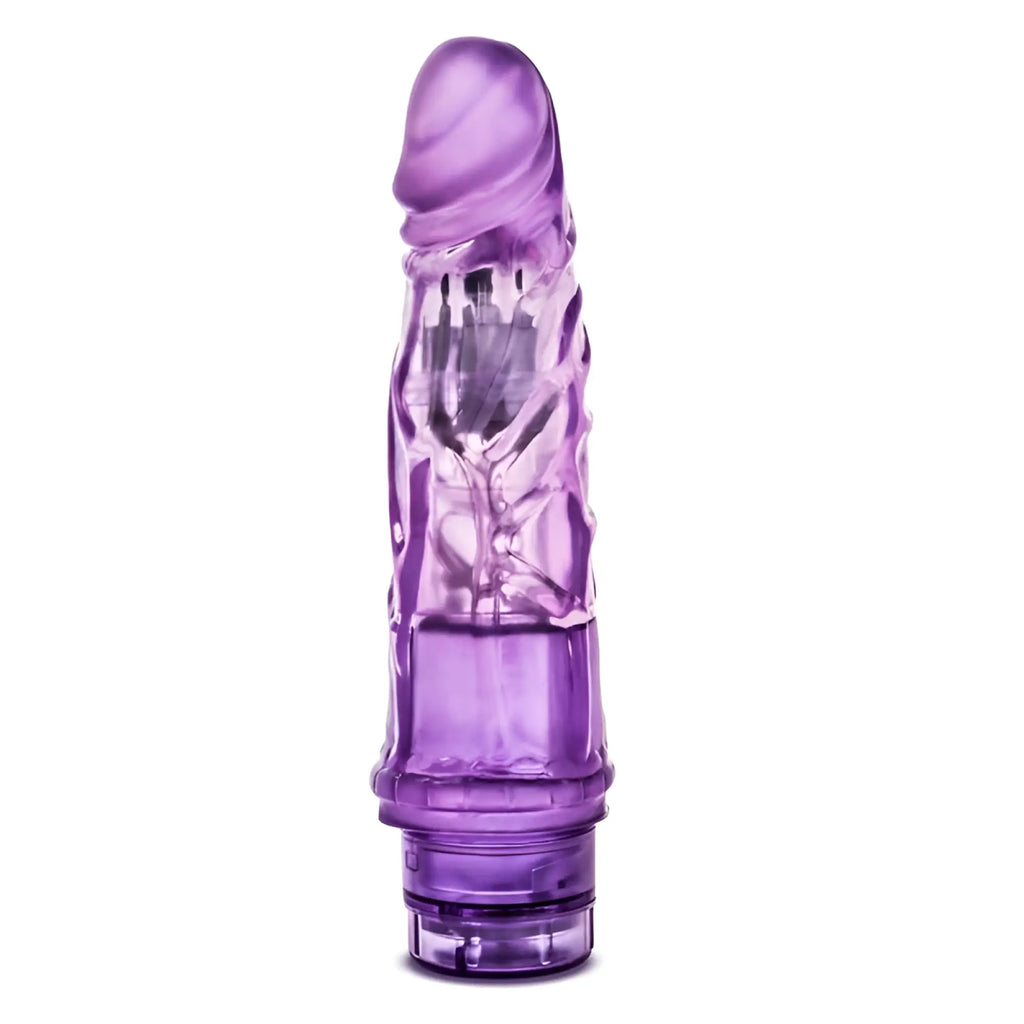B yours vibe no 3 purple translucent silicone vibratory toy with textured ridges and clear base seen from the back side