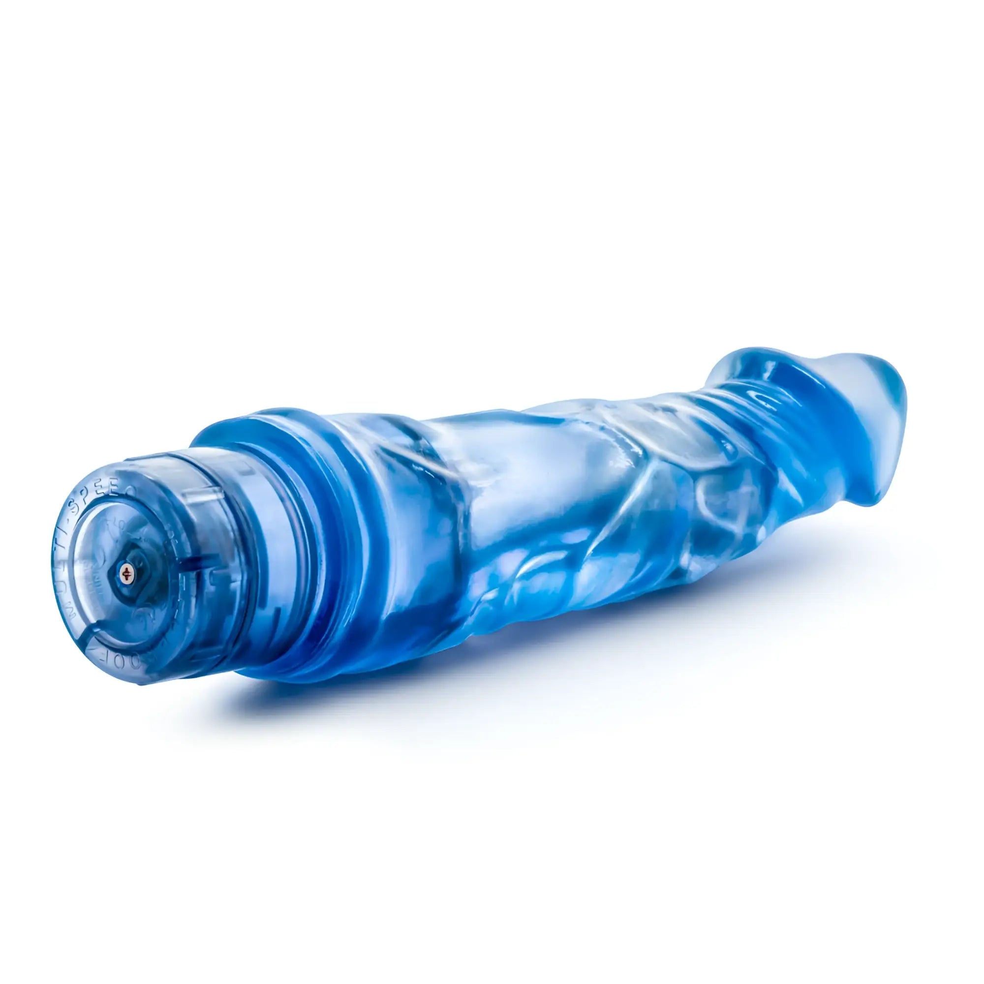 Blue translucent plastic toy with textured ridges and capped end from b yours vibe 6 blue product line