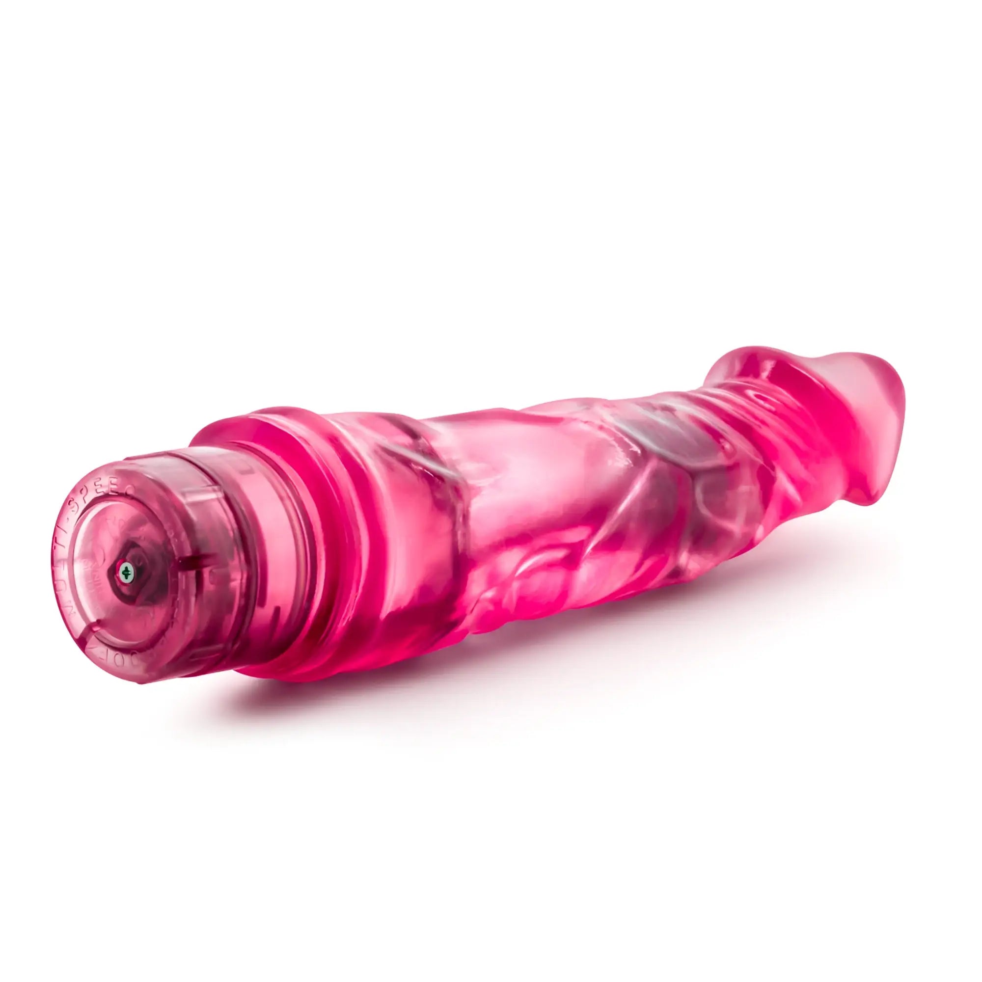 B yours vibe 6 pink translucent silicone vibrator with textured ridges and clear cylindrical head for personal use