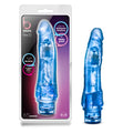 Blue translucent plastic vibratory toy with textured surface and rounded tip branded as b yours vibe 7 by blush