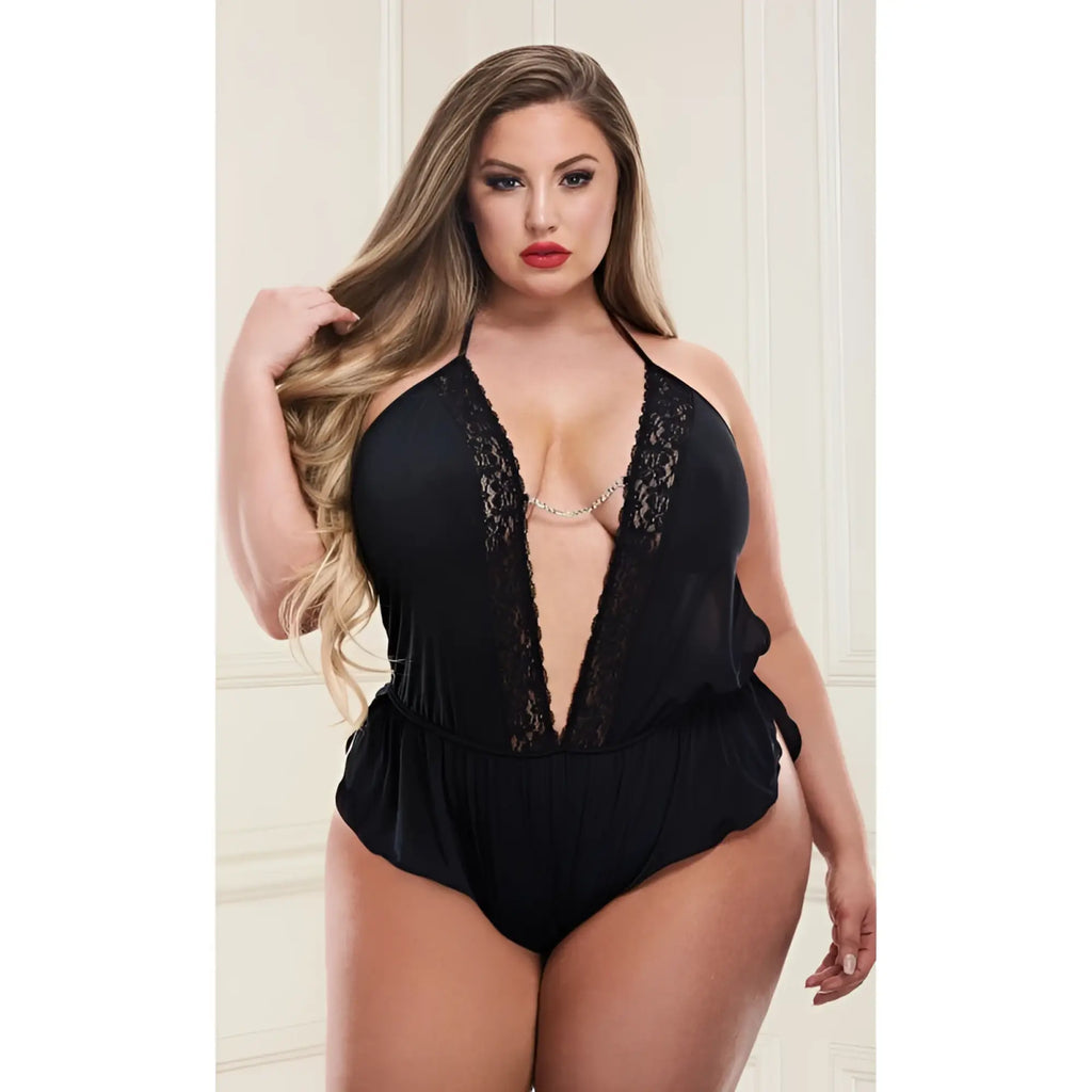 Black lace-trimmed halter satin teddy with deep plunging neckline and ruffled hem by baci lingerie plus size