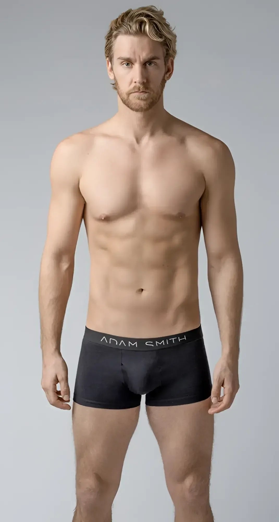Basic boxer trunks black adam smith menâs briefs with subtle textured fabric and sleek modern design front view