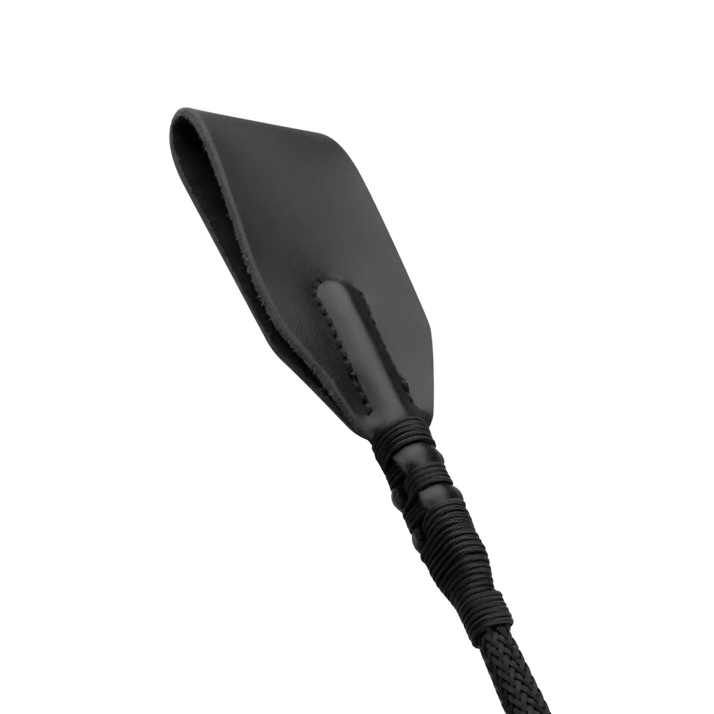 Black leather horsewhip with braided black cord handle from bedroom fantasies faux leather crop whip black collection