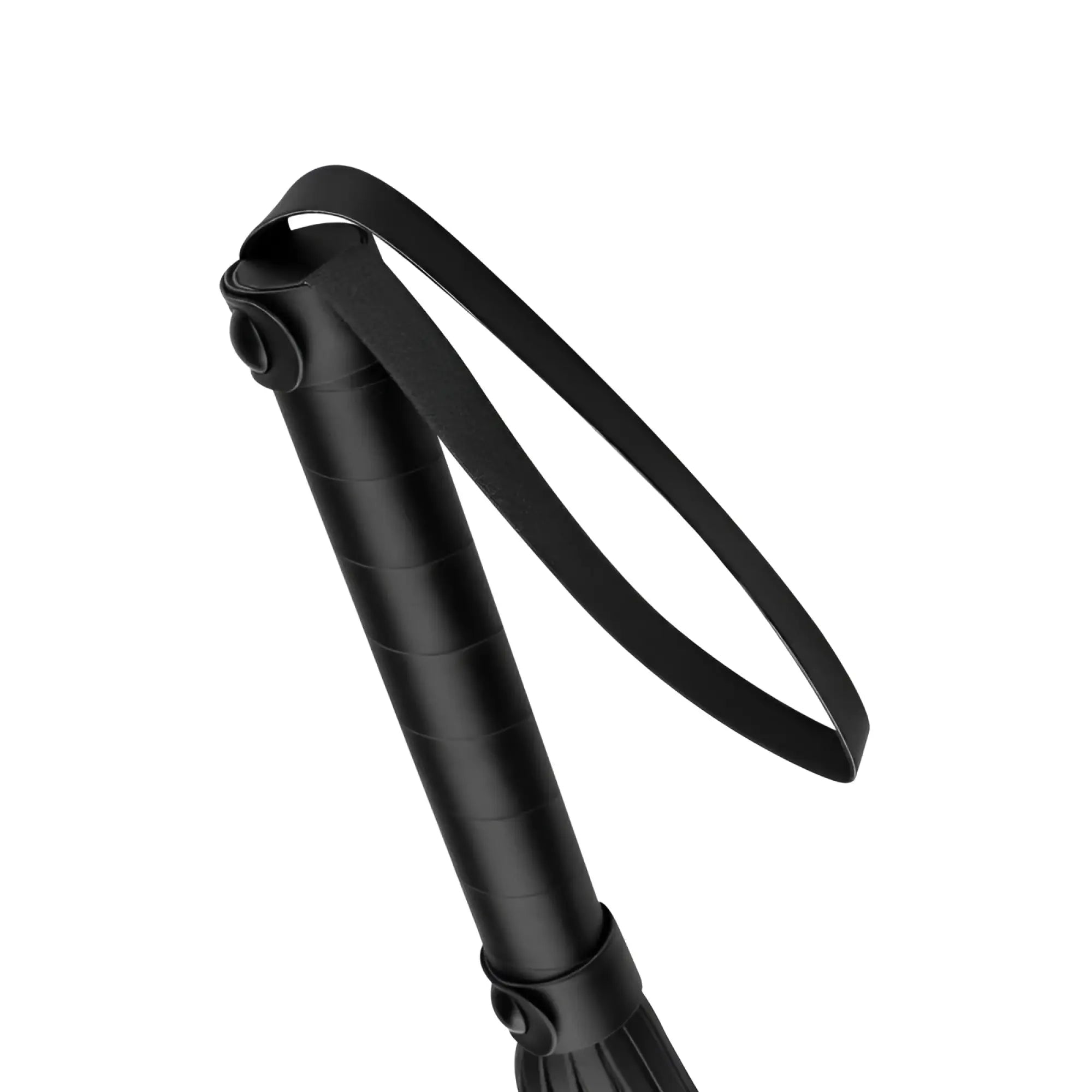 Black leather handle with looped strap and textured grip on bedroom fantasies faux leather flogger black